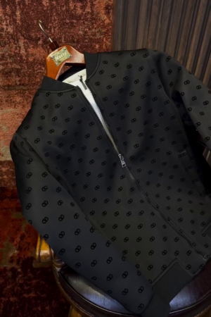 black Valentino Garavani bomber jacket with a tonal all-over pattern.